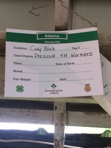 Livestock exhibitors fill out stall cards like this and staple them up above their pens.